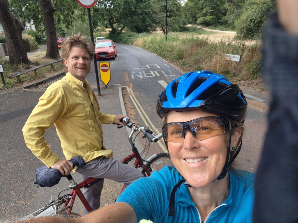 Henrik Dahle and Gemma Herbertson cycling July 2026